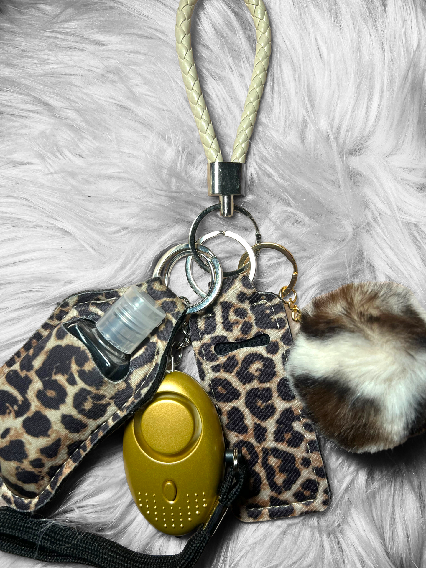 Cheetah girl safety alarm keychain